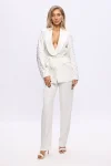 Compleu alb prevazut cu strasuri si pantaloni evazati