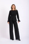 Compleu negru elegant format din pantaloni clopot si bluza cu volan la talie