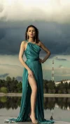 Rochie eleganta plisata de culoare turquoise si slit pe picior